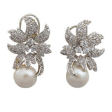 Women's Rhodium Plated CZ Floral Designer Stud Earrings with Glowing Pearls