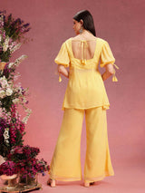 Women's Yellow Ethnic Motifs Embroidered V-Neck Sequinned Straight Kurta With Palazzo