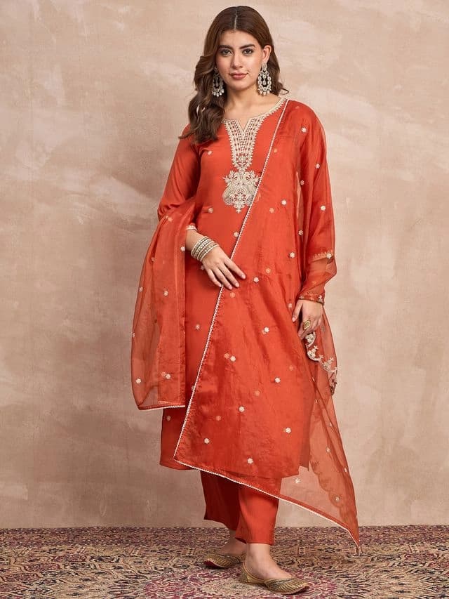 Women's Rust Kurta Set with Intricate Zari Embroidery Paired with Solid Trouser and Dupatta