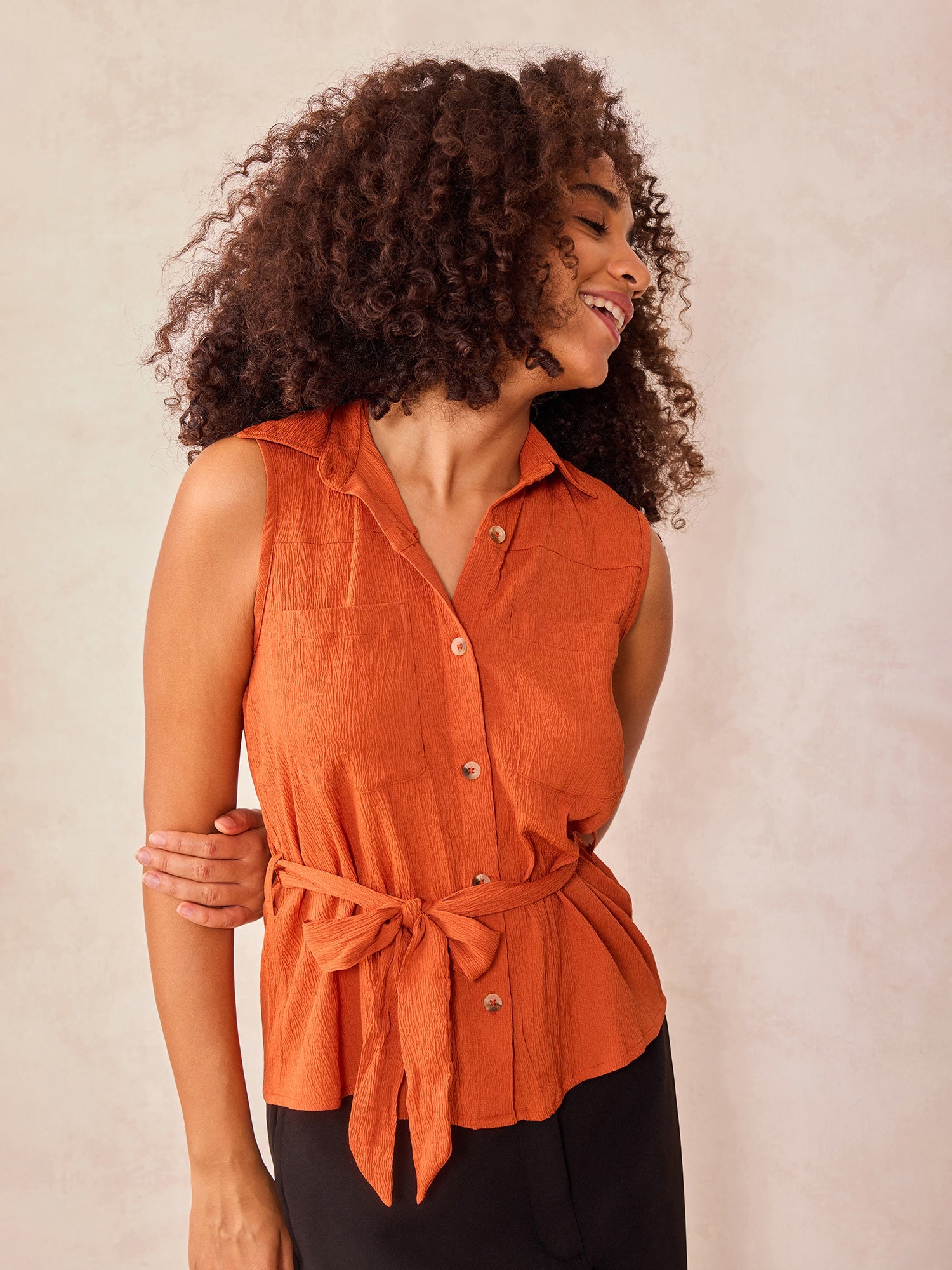 Women's Rust Sleeveless Shirt With Pocket And Tie Up Detail