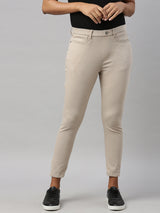 Women's Solid Beige Mid Rise Cropped Jegging