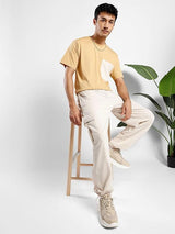 Men's Beige Cotton Tapered Knit Solid Jogger