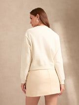 Women's Cream Varsity Graphic Sweatshirt