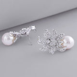 Women's Rhodium Plated CZ Floral Designer Stud Earrings with Glowing Pearls