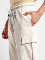 Men's Beige Cotton Tapered Knit Solid Jogger