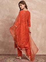 Women's Rust Kurta Set with Intricate Zari Embroidery Paired with Solid Trouser and Dupatta