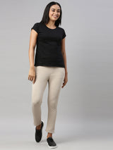Women's Solid Beige Mid Rise Cropped Jegging
