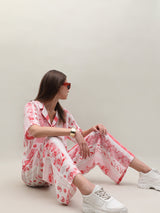 Women's White and Pink Casual Printed Flared Trouser