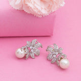 Women's Rhodium Plated CZ Floral Designer Stud Earrings with Glowing Pearls
