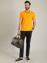 Men's Orange Casual Regular Fit Solid Half Sleeves Polo Tshirt