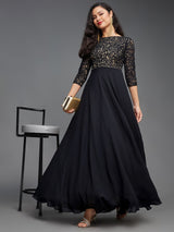 Women's Black Self Design Boat Neck Side Pocketed Georgette Fit and Flare Maxi Dress