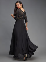 Women's Black Self Design Boat Neck Side Pocketed Georgette Fit and Flare Maxi Dress