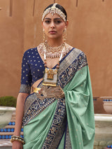Women's Silk Blend Green Woven Design Designer Saree with Blouse Piece